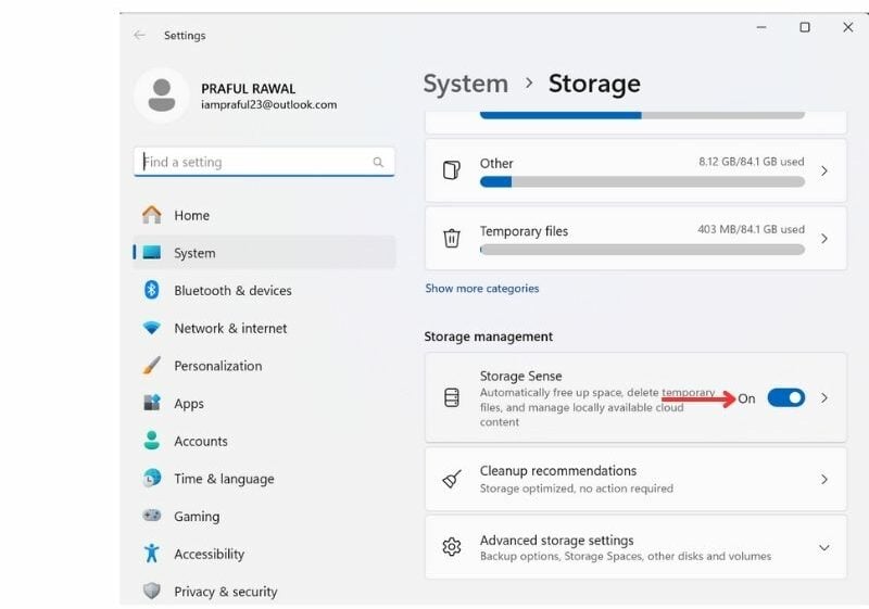 Toggling on Storage Sense in Windows 11 to automatically free up disk space