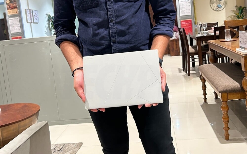 Asus S14 Laptop in hand