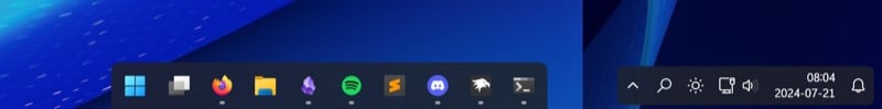 best windhawk mods 4 Translucent Taskbar theme on a Windows 11 desktop.