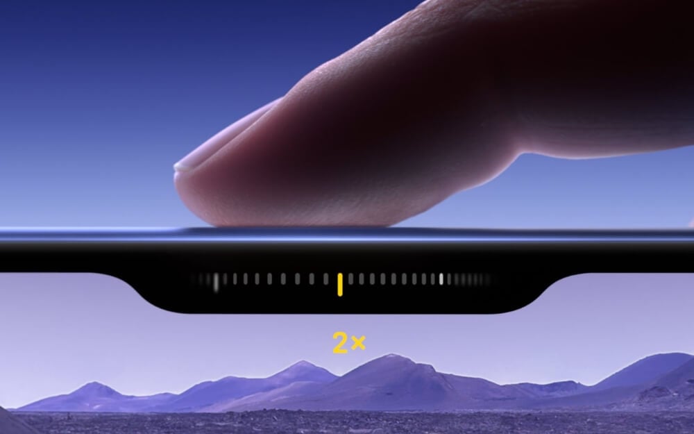 He made showing the camera control button on the iPhone