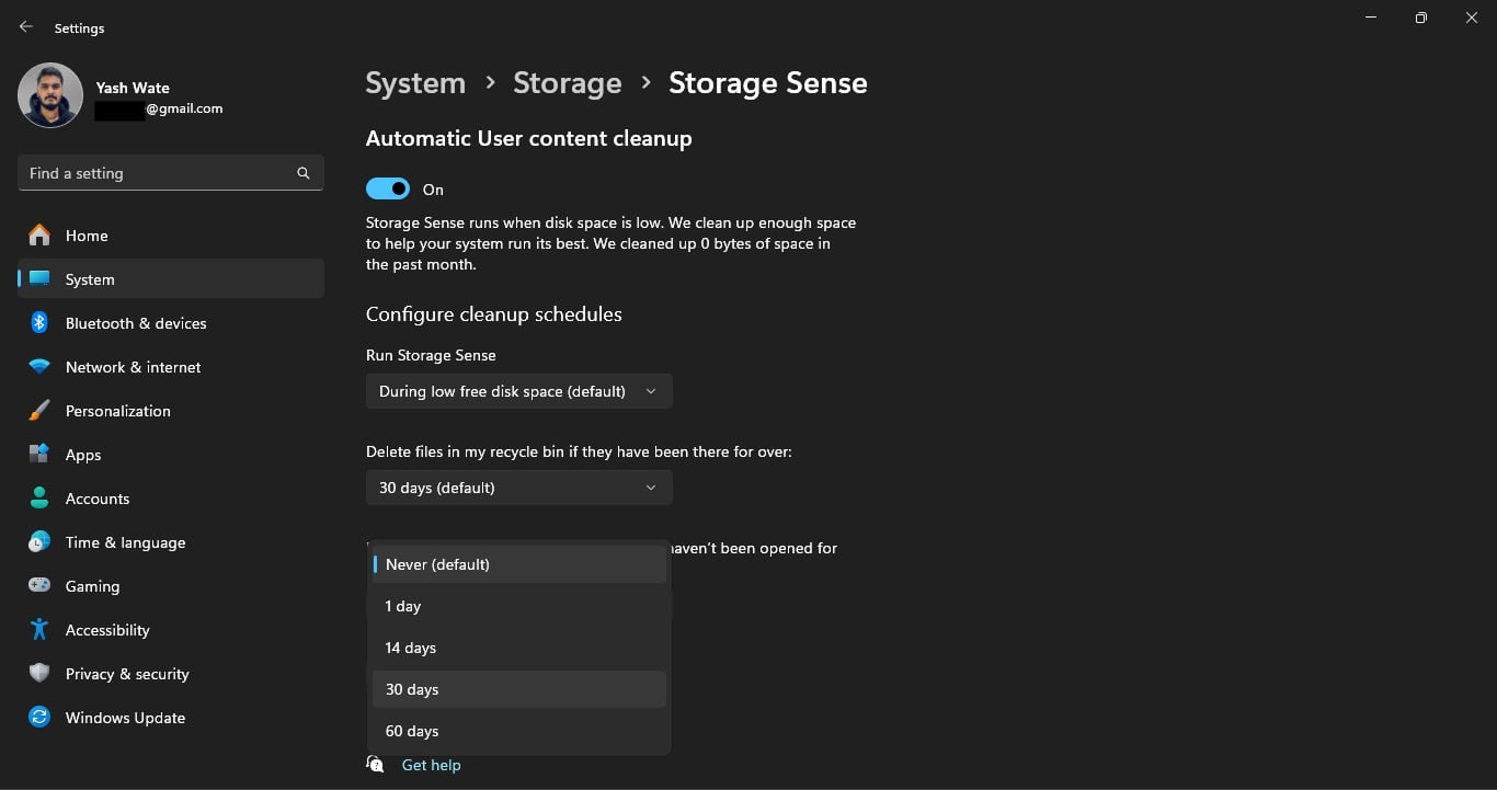 Configuring Storage Sense to clean files in Downloads that haven't been opened for 30 days.